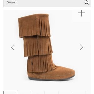 Minnetonka three tier fringe leather boots.